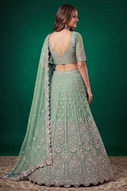 Pistachio green lehenga and choli with zari and dori embroidery