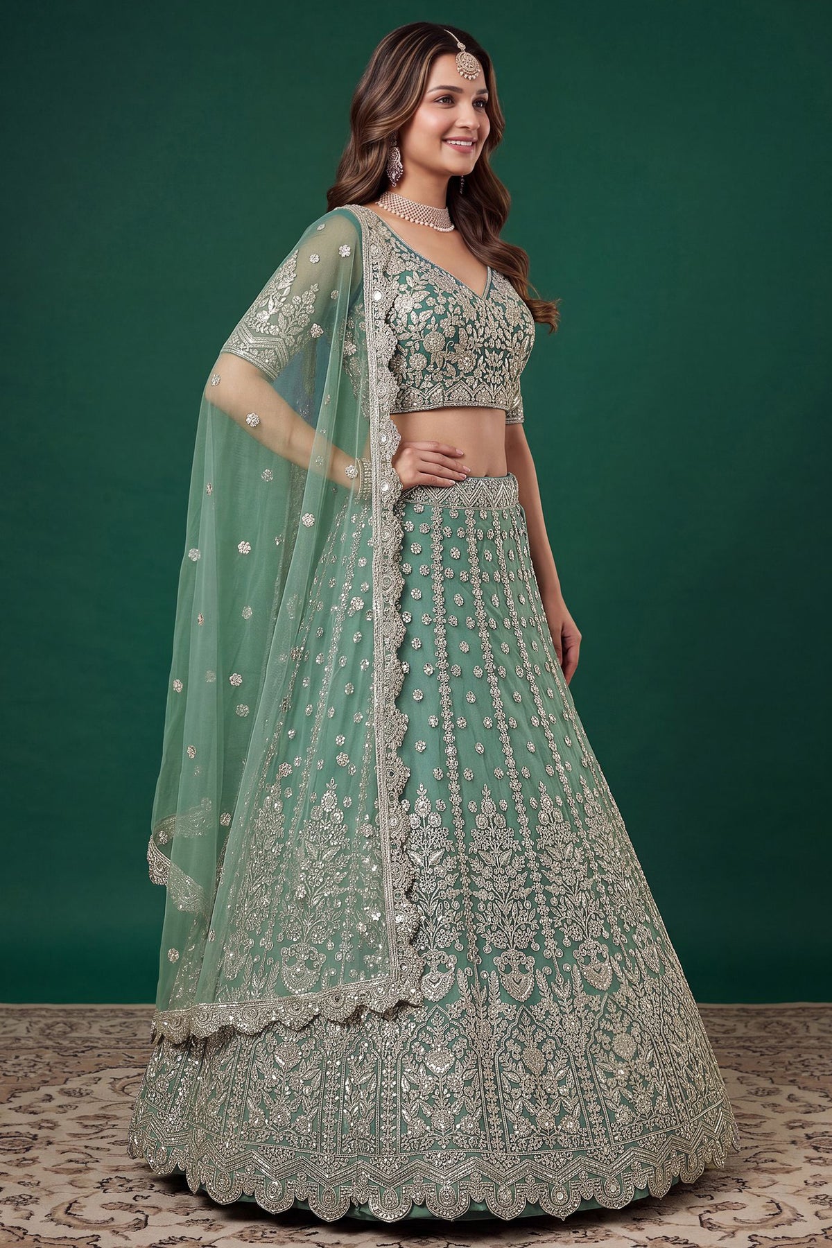 Pistachio green lehenga and choli with zari and dori embroidery