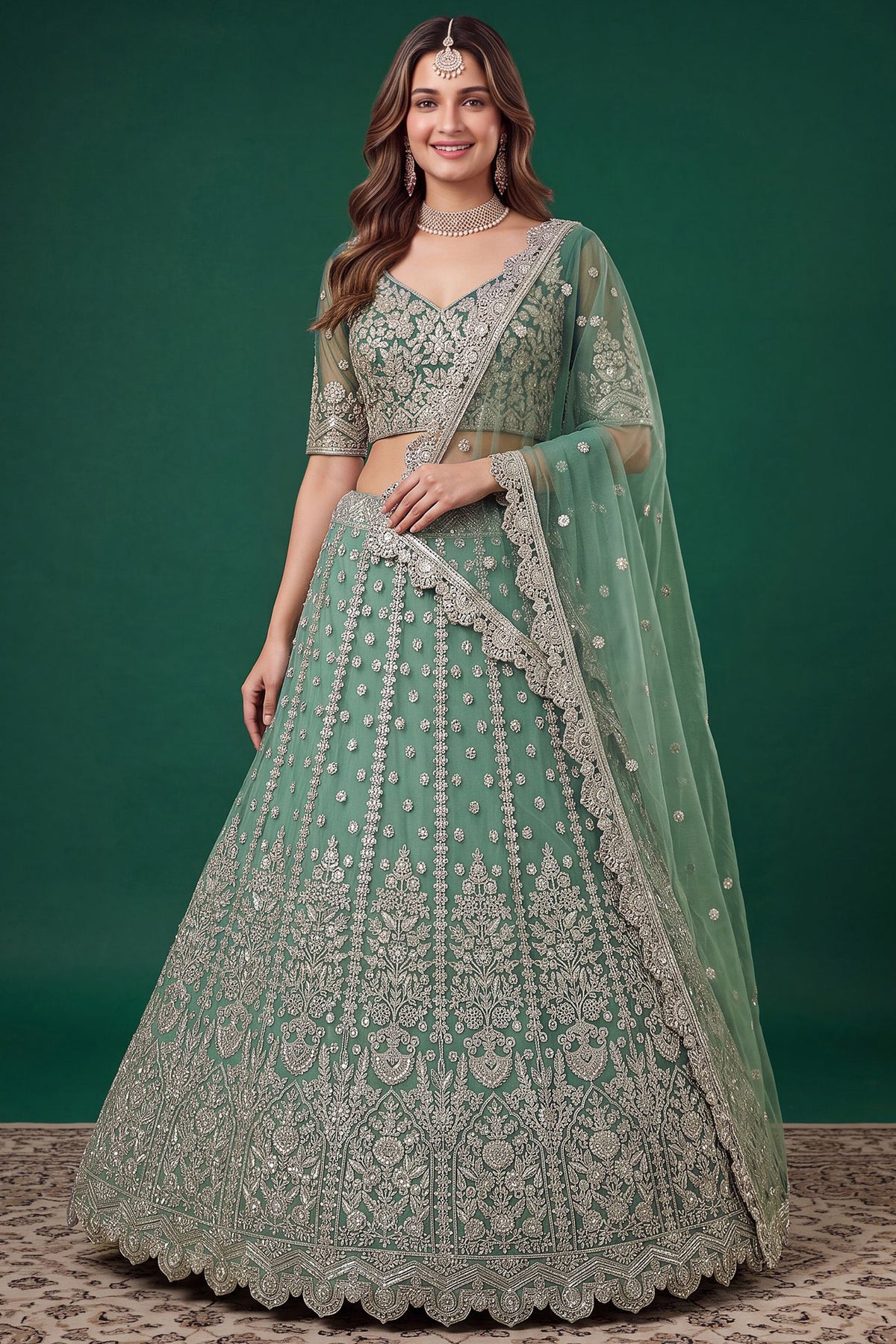Pistachio green lehenga for wedding front view with embroidered choli