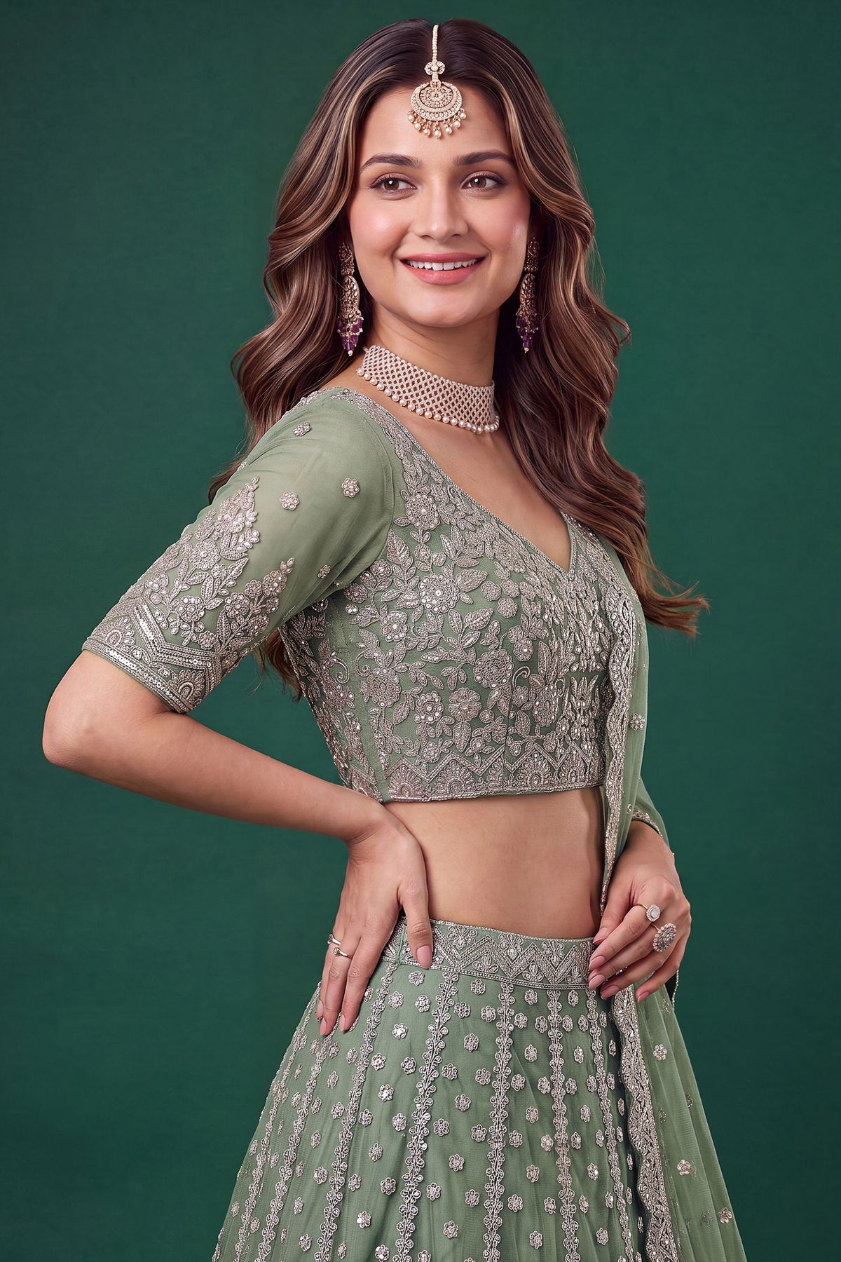 Lehenga and choli side view with embroidered detailing