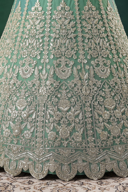 Embroidered lehenga hem detail in pistachio green