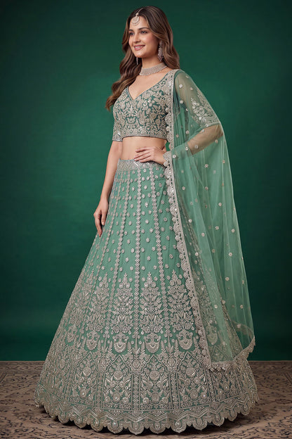 Pistachio green lehengha choli side view with dupatta