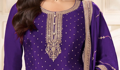 Close-up of zari and coding work on purple kameez neckline