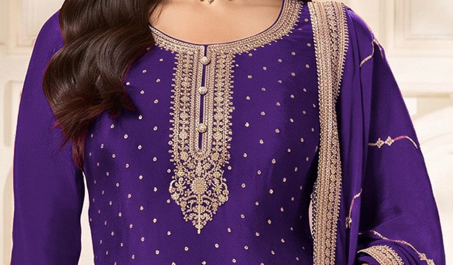 Close-up of coding work on purple kameez plazzo neckline
