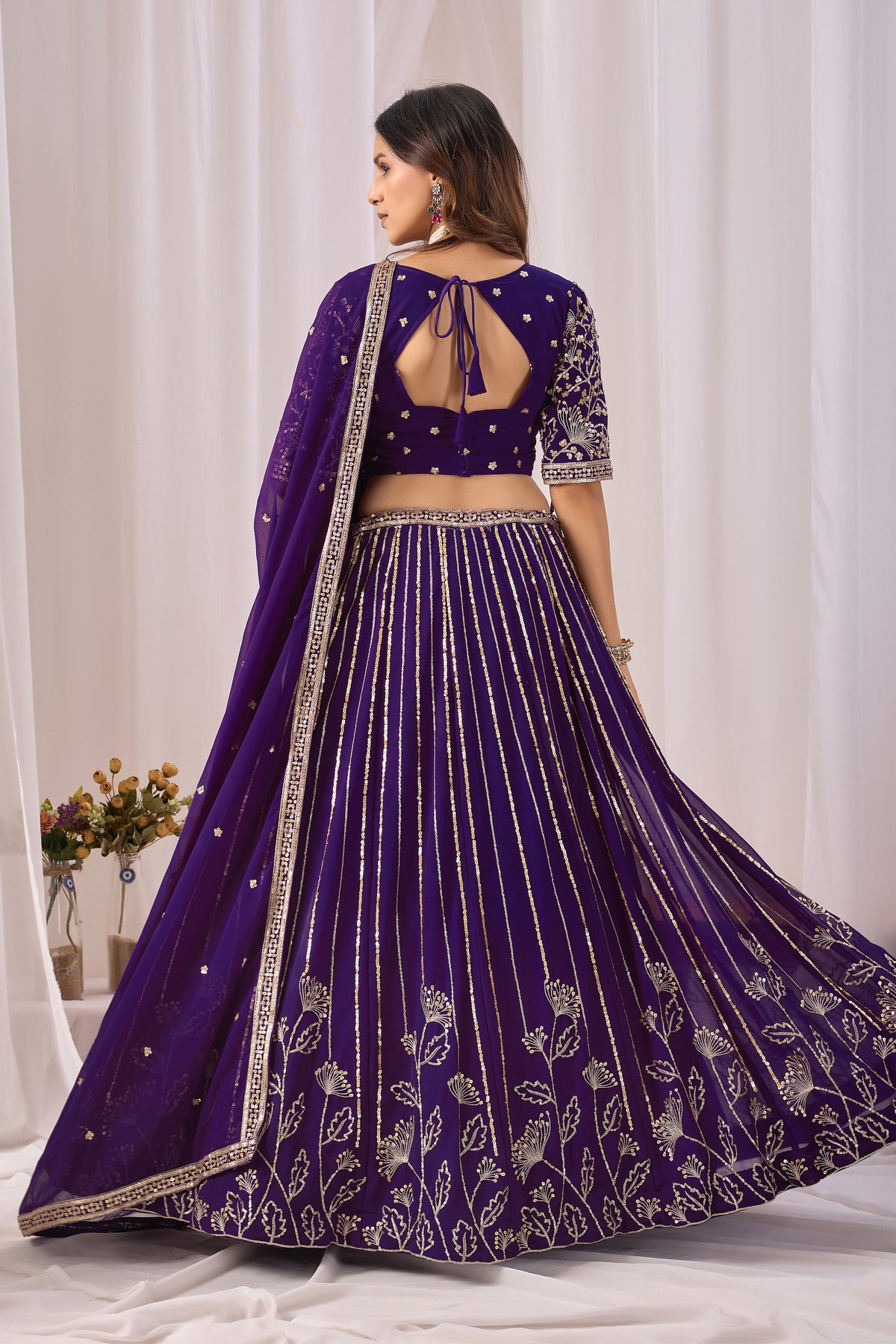 Back view of the purple blouse, if shown