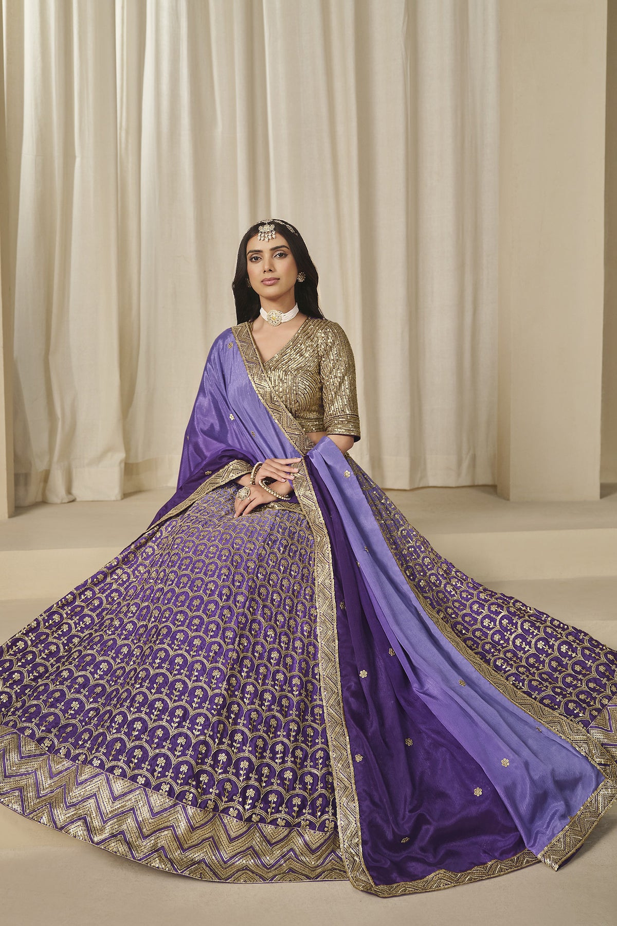 Purple dupatta with embroidered border and matching lehenga