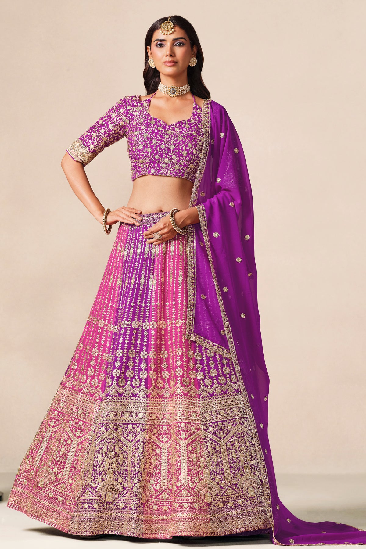 Hem detail of the purple embroidered lehenga skirt