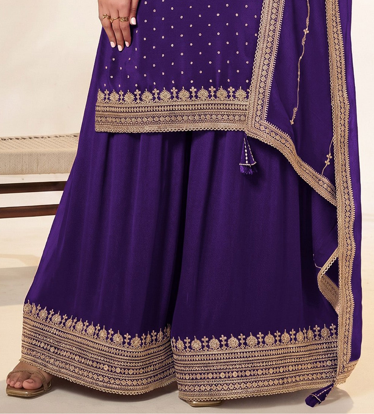 Back view of purple plazzo dress with embroidered border
