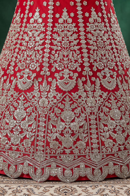 Embroidered lehenga hem detail in red
