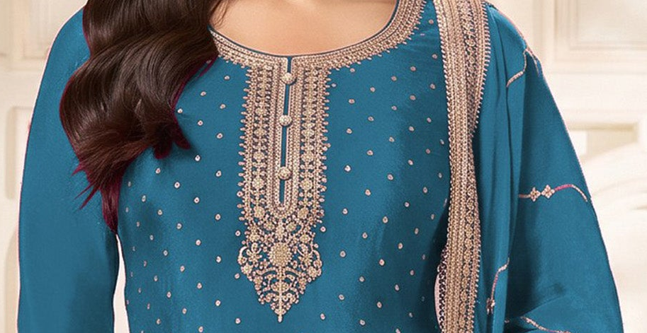 Close-up of sequence work on sky blue kameez neckline