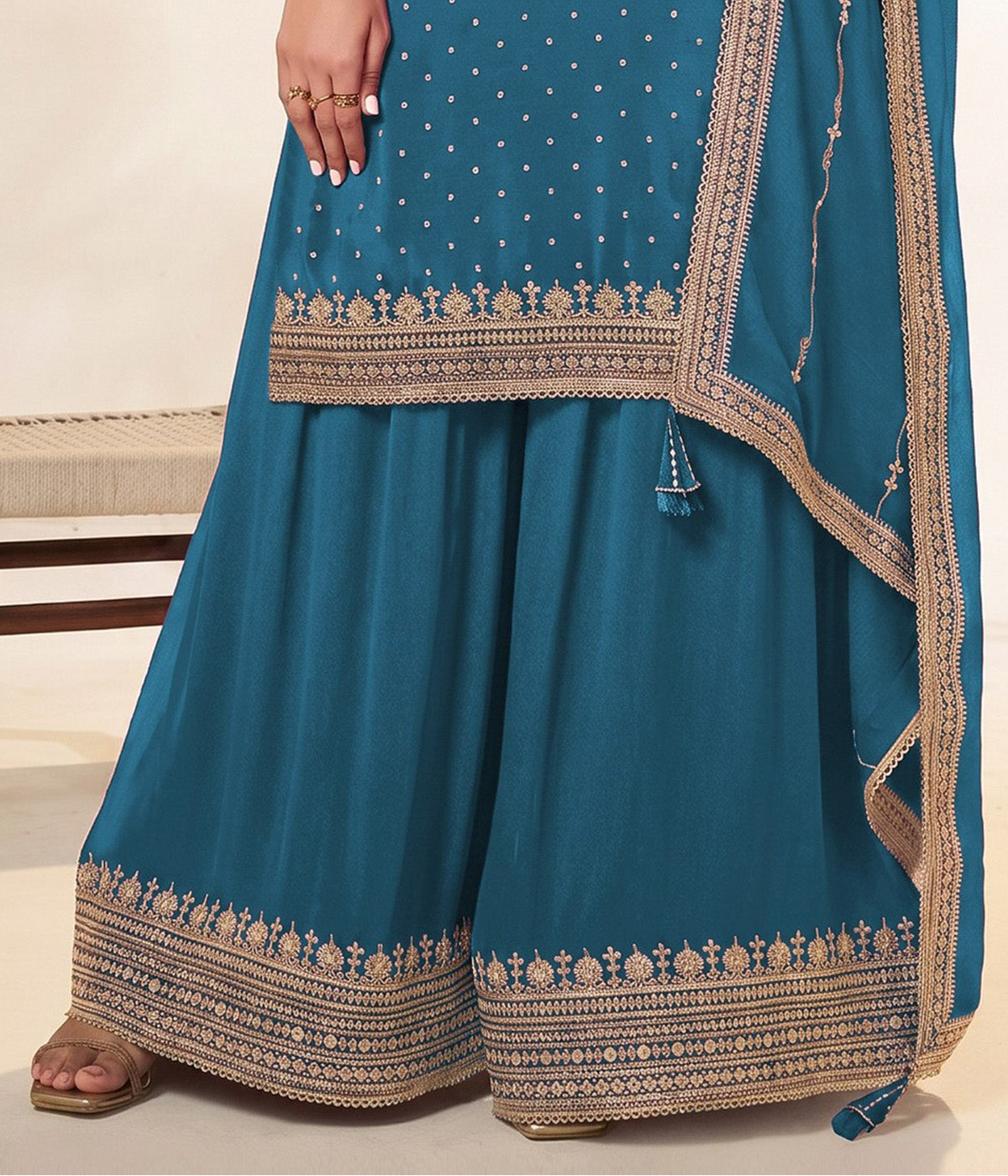 Back view of sky blue stitched palazzo suit for women