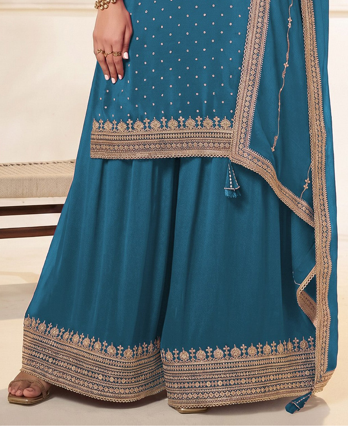 Back view of sky blue stitched party wear suit