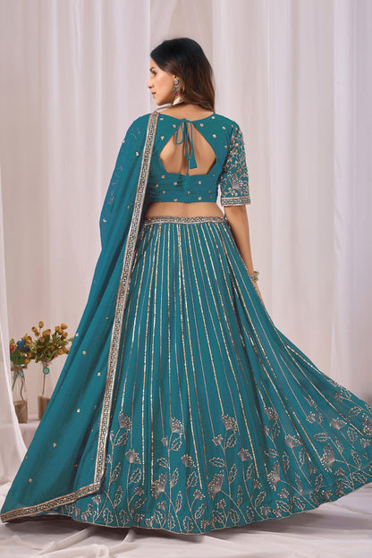 Back view of the teal blue blouse, if shown.