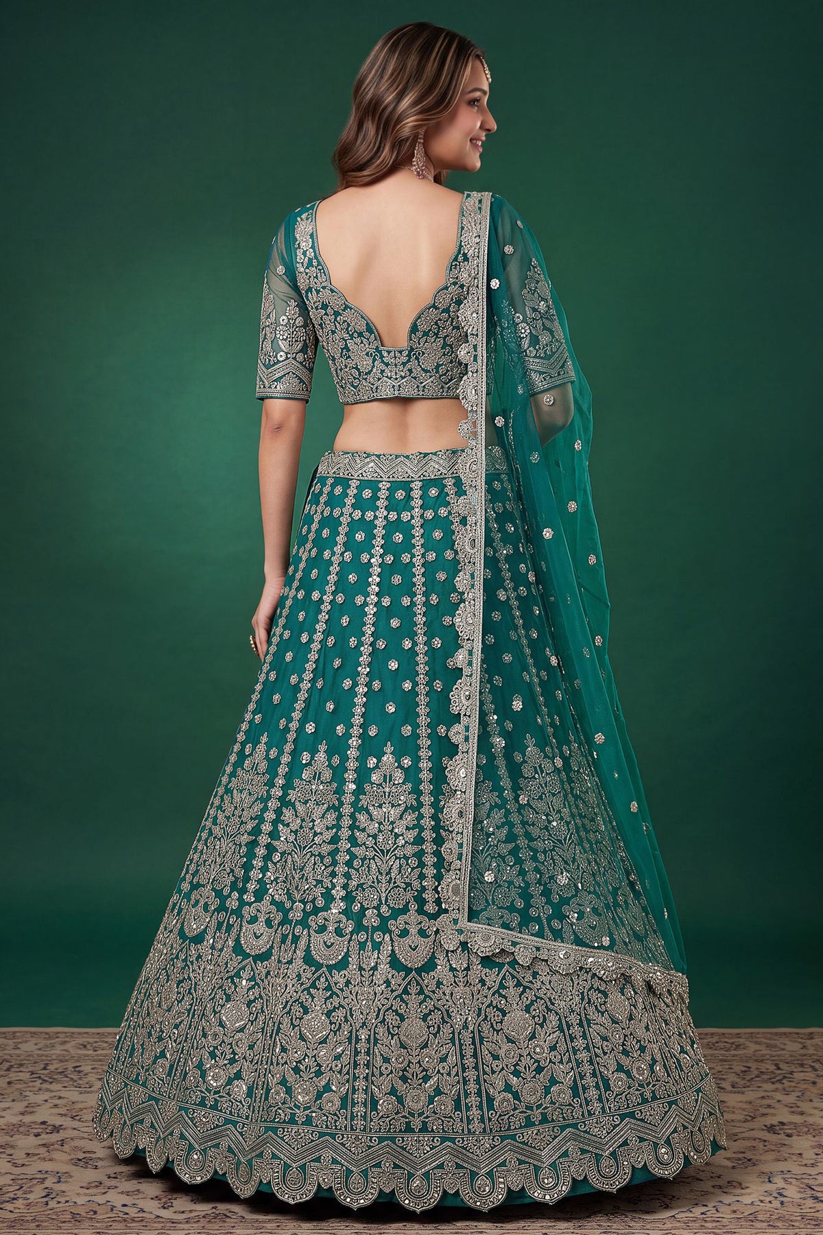 Tealblue ghagra choli back side view with Soft Net dupatta