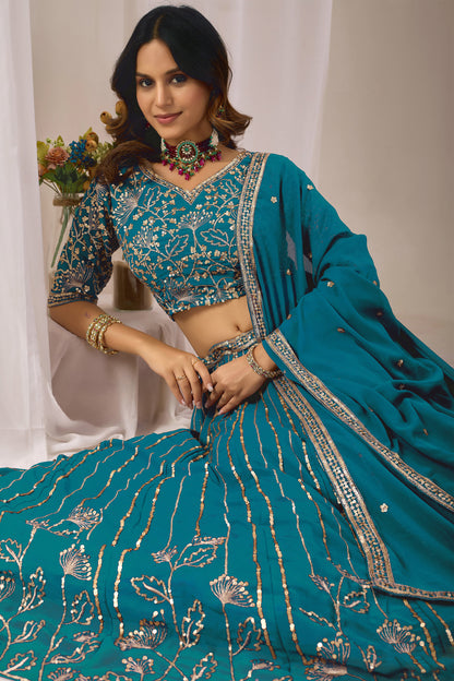 Close-up of heavy embroidery and sequin work on the lehenga.