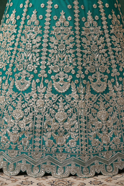 Teal blue stitched blouse, close-up