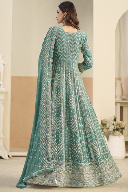 Back view of teal green anarkali salwar suit with embroidered hem