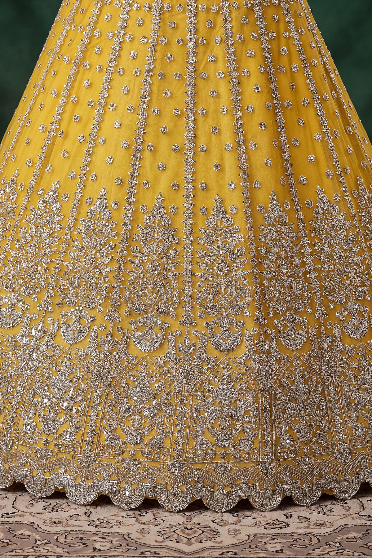 Zari and dori embroidery detail on yellow lehenga