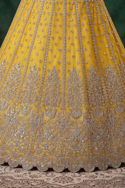 Zari and dori embroidery detail on yellow lehenga